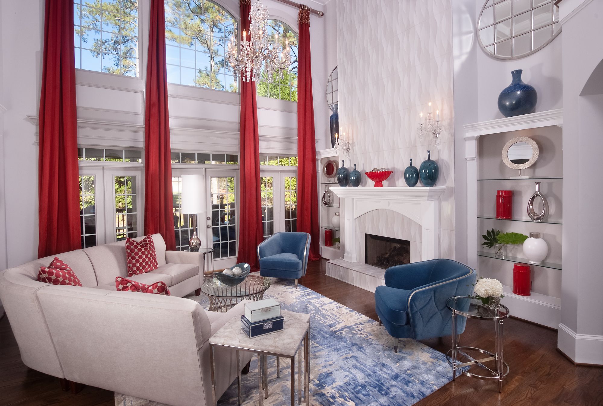 living room interior design with red and blue accesories